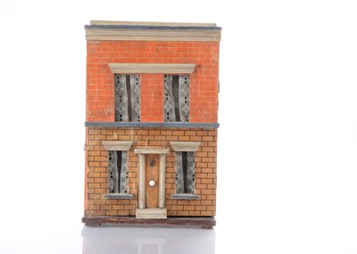Lot 911 - A small early 20th century box back dolls’ house