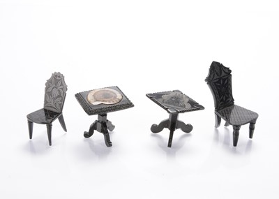 Lot 912 - Four 19th century pieces of Whitby jet dolls’ house furniture