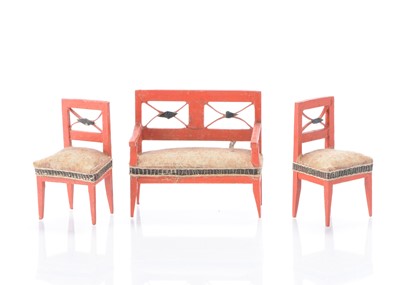 Lot 916 - An early to mid 19th century Erzgebirge  dolls’ house red painted sofa and two chairs