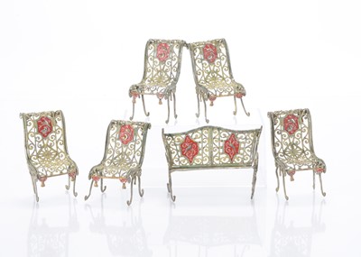 Lot 918 - Late 19th century German soft metal dolls’ house garden chairs