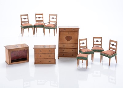Lot 919 - A mid 19th century German plain wood dolls’ house set