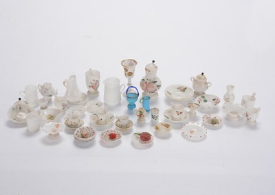 Lot 921 - A quantity of Lauscha milk glass dolls’ house vessels