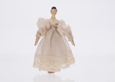 Lot 924 - An early 19th century Grodnerthal wooden dolls’ house doll