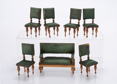 Lot 940 - A late 19th century German dolls’ house sofa and six chairs