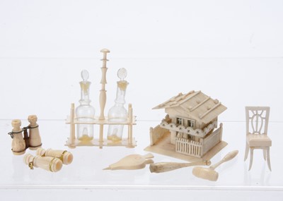 Lot 946 - A 19th century bone dolls’ house tantalus