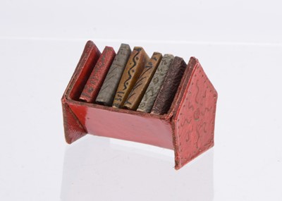 Lot 980 - A Westacre card dolls’ house book stand