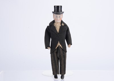 Lot 989 - A German dolls’ house bisque shoulder-head man doll