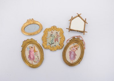Lot 1019 - Gilt metal dolls’ house pictures and mirrors