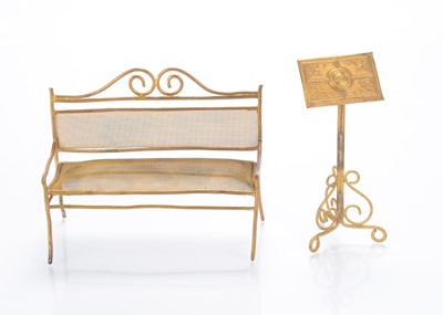 Lot 1025 - A gilt metal dolls’ house music stand