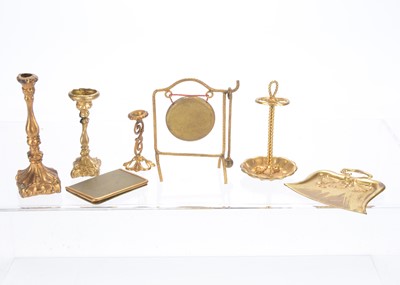 Lot 1026 - Gilt metal dolls’ house chattels