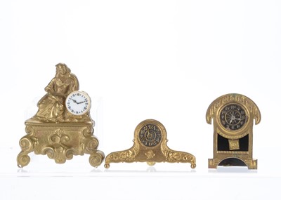 Lot 1027 - Three dolls’ house clocks