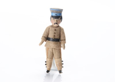 Lot 1031 - A rare German all-bisque Japanese soldier dolls’ house doll