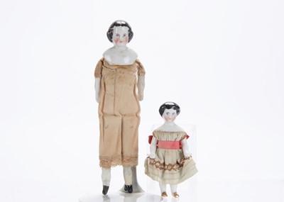 Lot 1039 - An 19th century china Frozen Charlotte dolls’ house doll