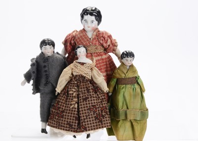 Lot 1043 - German shoulder-head dolls’ house dolls