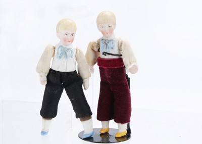 Lot 1064 - Hertwig bisque twin boy dolls’ house half dolls