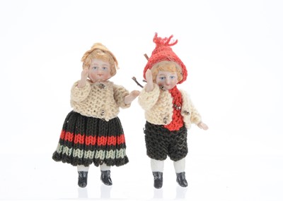 Lot 1065 - Two German all-bisque dolls’ house children