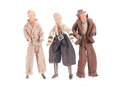 Lot 1069 - Three Caco dolls’ house male dolls