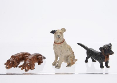 Lot 1073 - German lead dogs suitable for a dolls’ house