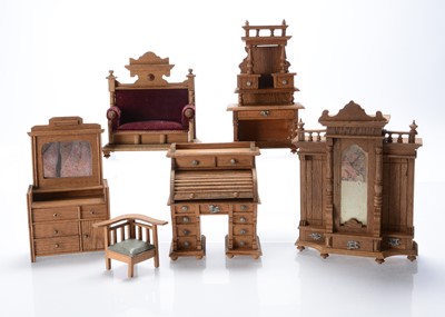 Lot 1094 - Early 20th century German larger scale oak dolls’ house furniture