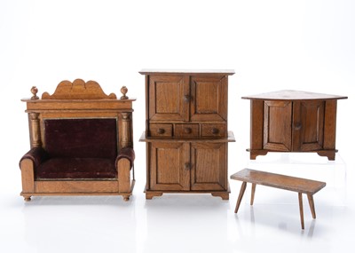 Lot 1095 - German larger scale oak dolls’ house furniture