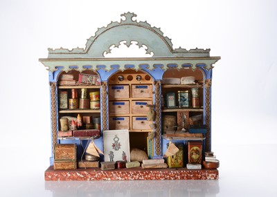 Lot 1099 - A late 19th century French wooden toy shop