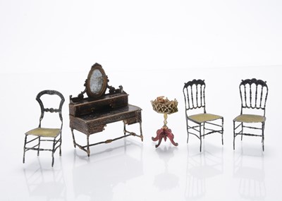 Lot 1109 - 19th century German soft metal dolls’ house furniture