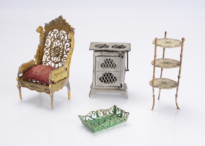Lot 1110 - 19th century German soft metal dolls’ house furniture