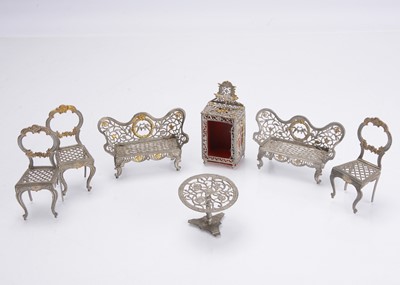 Lot 1112 - 19th century German soft metal dolls’ house furniture