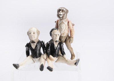 Lot 1117 - Three rare mid to late 19th century German personality dolls’ house dolls