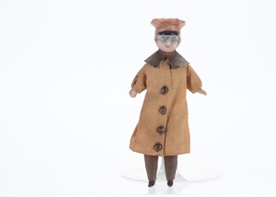 Lot 1119 - A German dolls’ house shoulder-head dolls’ house motorist doll