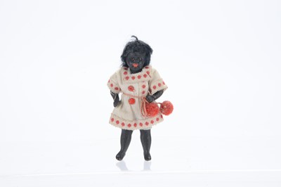 Lot 1120 - A German all-bisque dolls’ house black doll