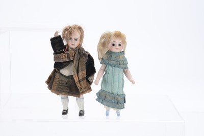 Lot 1123 - Two German all-bisque dolls’ house dolls