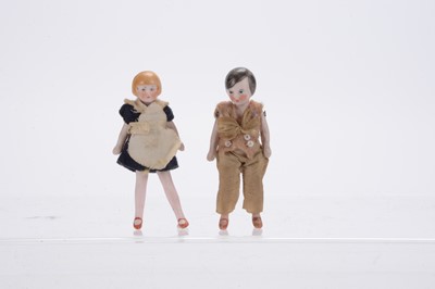 Lot 1124 - Two 1930s German all bisque dolls’ house dolls