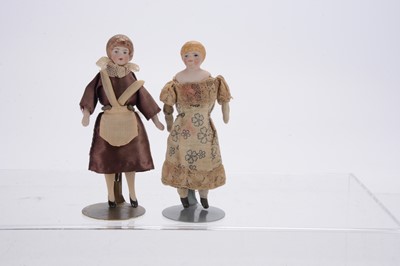 Lot 1129 - Two German bisque shoulder-head dolls’ house dolls
