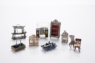 Lot 1139 - German small scale metal dolls’ house chattels and furniture