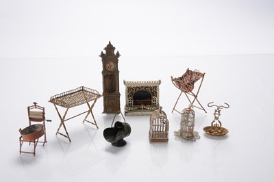 Lot 1140 - German metal dolls’ house chattels and furniture