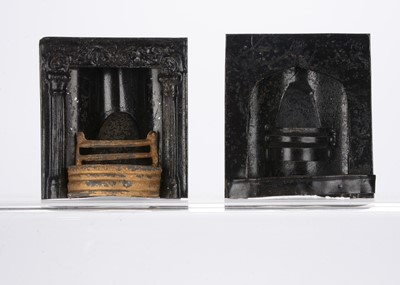 Lot 1147 - A small Evans & Cartwright tinplate dolls’ house fire place