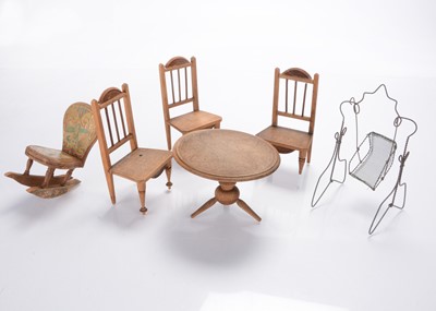 Lot 1149 - A wire and mesh dolls’ house garden swing