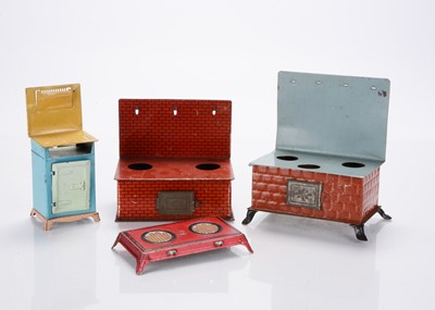 Lot 1153 - Large scale dolls’ house tinplate cookers