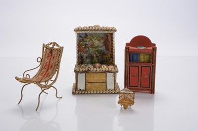 Lot 1154 - A late 19th century gilt-metal watch stand dolls’ house chair