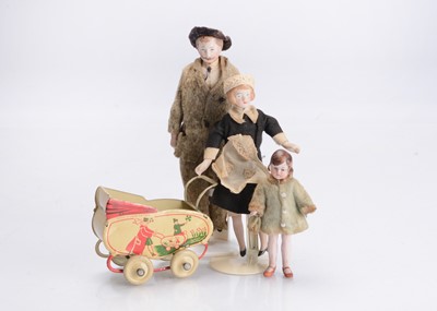 Lot 1188 - Three German dolls’ house dolls