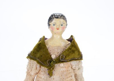 Lot 1216 - An early 19th century German wooden shoulder-head doll