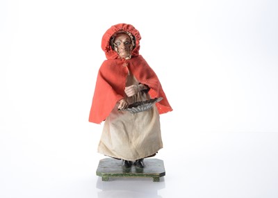Lot 1218 - A rare early 19th century John Hempel British automaton pedlar toy doll
