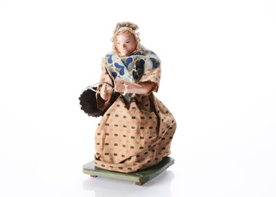 Lot 1221 - A rare mid 19th century John Hempel British automaton elderly woman toy doll