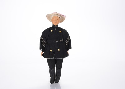 Lot 1229 - A rare Door of Hope carved wooden headed Shanghai policeman