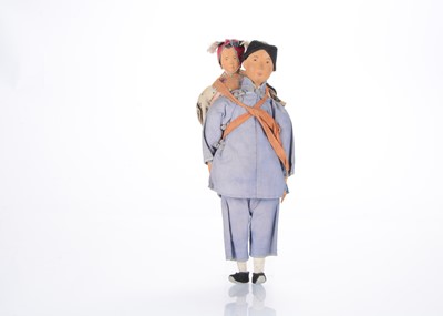 Lot 1230 - A Door of Hope carved wooden headed Amah with baby