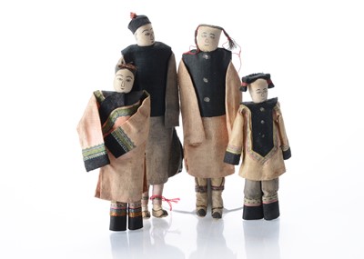Lot 1236 - Four small Chinese cloth doll family, probably late 19th century