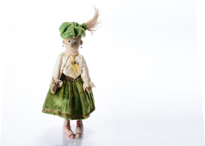 Lot 1237 - An interesting velvet ‘Boy’ doll in the style of Steiff