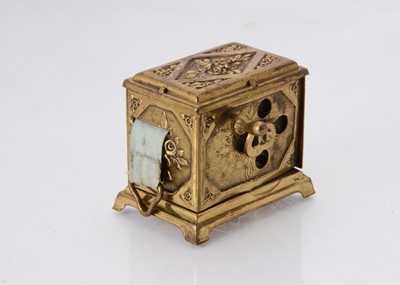Lot 1253 - A rare late 19th century Punch & Judy brass musical tape measure