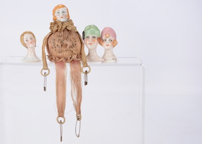 Lot 1296 - Four German Flapper head pin-cushion/half dolls